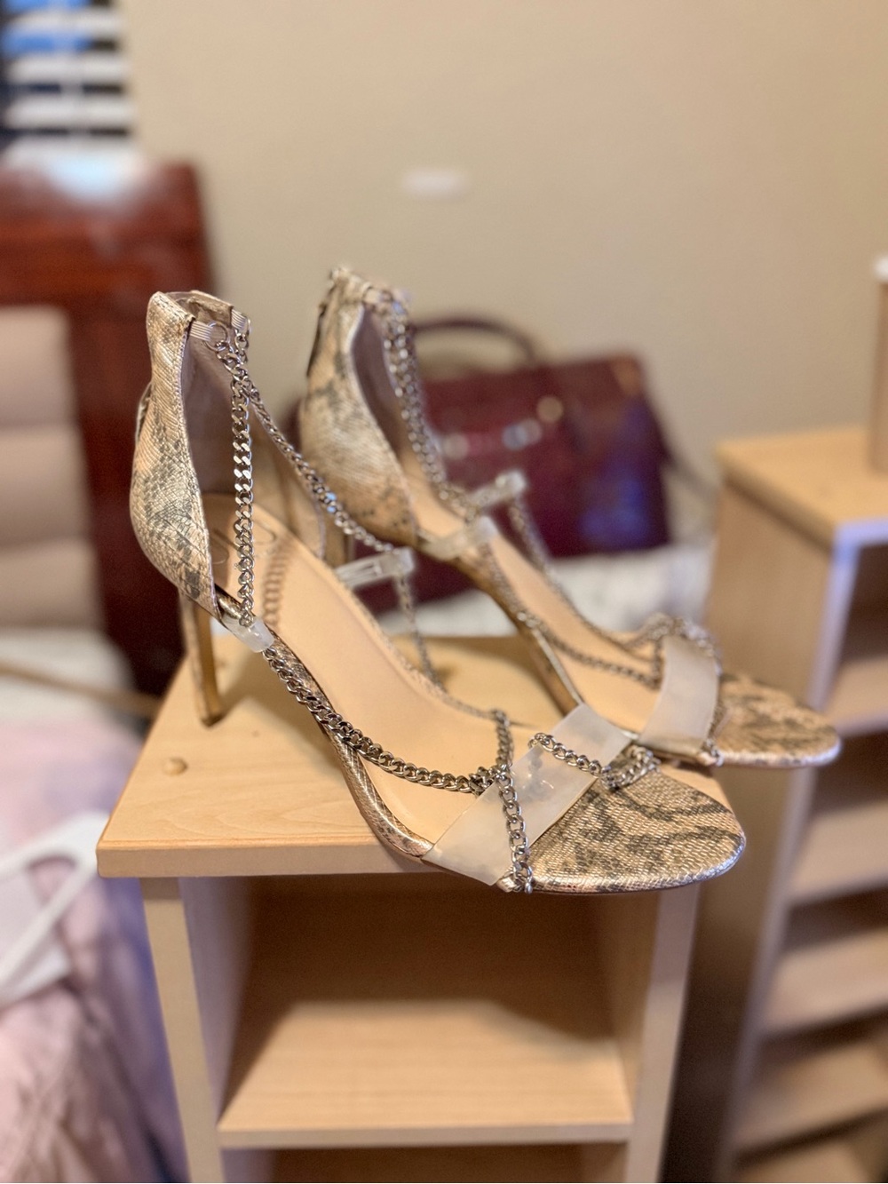 Jennifer Lopez Snake-Print Stiletto Sandals with Chain Detail in Beige